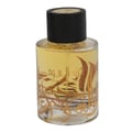 Ard Al Zaafaran Mousuf Ramadi — Green perfume bottle splashing in a rain puddle on a city street.