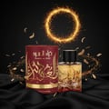 Ard Al Zaafaran Mousuf Wardi — Pink powder explosion around a perfume bottle inside a car.