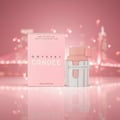 Armaf Club De Nuit Milestone — Rose gold perfume bottle on car dashboard with city skyline at night