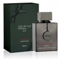 Ard Al Zaafaran Thara Al Oud Supreme Intense – Red cylindrical box and clear glass bottle with gold Arabic script and dark