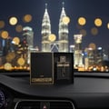Armaf Aoud Odyssey 100ml EDP Men — Man in suit holding gold bottle against neon lights and city skyline