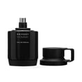 Ard Al Zaafaran Shams Al Emarat Khususi 100ml EDP Unisex — Box, spray bottle, and perfume bottle on a table with coffee and