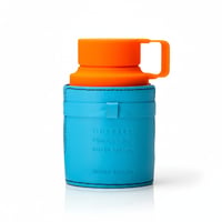Armaf Odyssey Mandarin Sky — Blue leather sleeve with orange cap and handle, white background