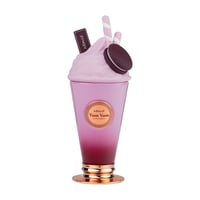 Armaf Yum Yum — Pink milkshake-shaped perfume bottle with whipped cream top, cookie, and straws, on a gold base