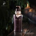 Perfume bottle labeled 'Stellar' by Khadlaj on a dark background