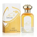 Armaf Club De Nuit Woman — Clear glass perfume bottle with gold cap and chain charm next to a pale pink box