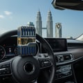 Armaf Dubai Nights Midnight — Black perfume bottle with silver cap and circular charm, set against a blurred city skyline at