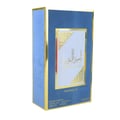 Armaf Odyssey Candee Special Edition — Pink box and striped perfume bottle with pink cap against a blurred pink city
