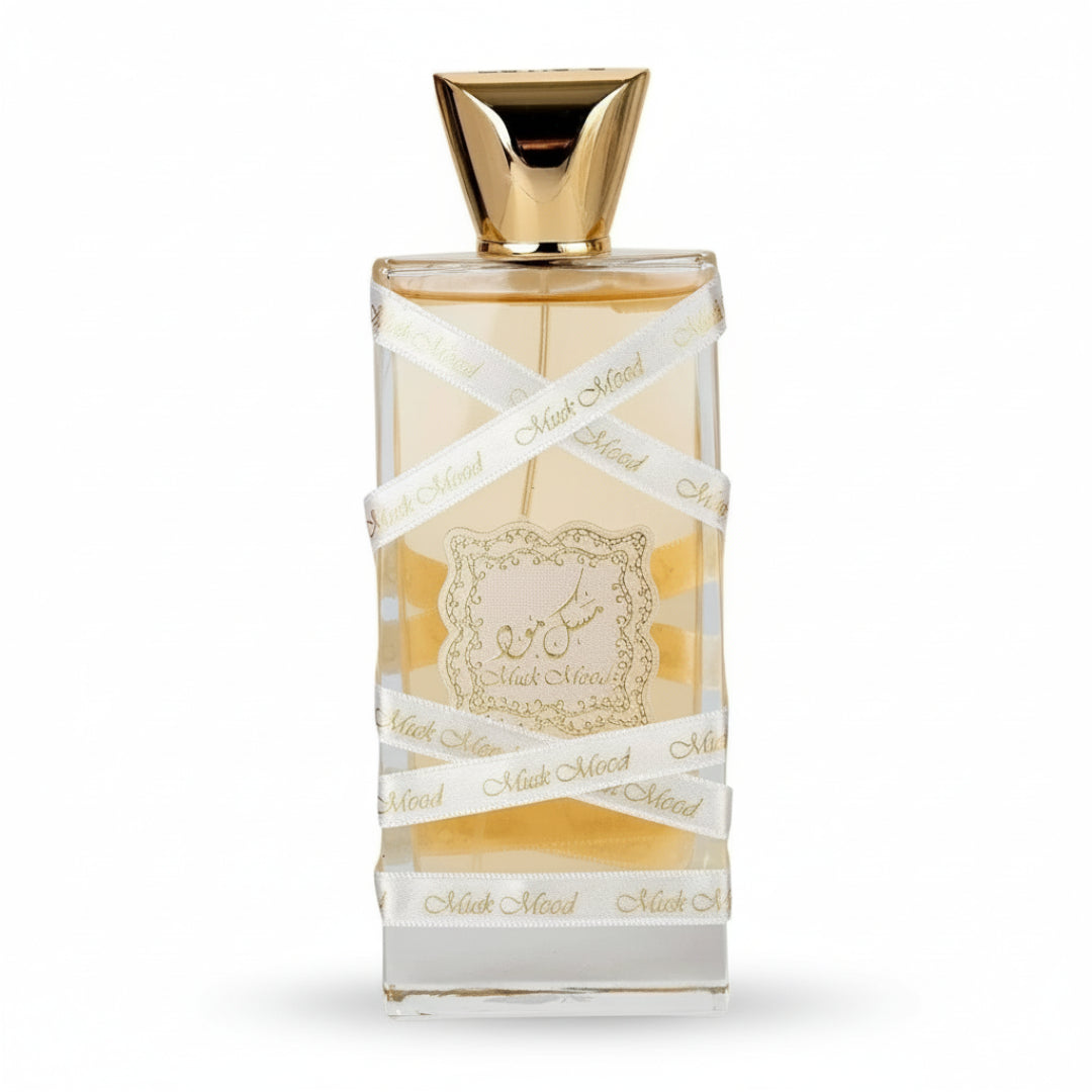 Perfume bottle with gold cap and decorative label on a white background