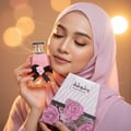 Lattafa Badee Al Oud by Lattafa Oud for Glory — Black gift box with gold accents, showcasing a perfume bottle and smaller