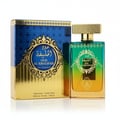 Lattafa Fire On Ice — Gold-accented box and clear glass bottle with golden liquid, on a white reflective surface.