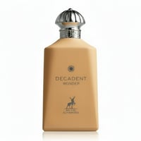 Maison Alhambra Decadent Wonder Her EDP 100 ml Alhambra — A tan-colored perfume bottle with a silver ornate cap, featuring a sun logo and a deer silhouette.