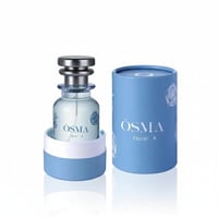 Osma Osma Floral A Ginger Blossom 75ml — A clear glass perfume bottle with a silver cap, presented in a light blue cylindrical box with rose motifs, set against a white background.