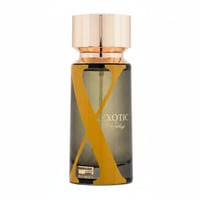 Rue Broca Exotic Heritage by Rue Broca 100ml EDP Men — Tall glass perfume bottle with a gradient dark grey to clear glass, featuring a large yellow 'X' design and the text 'EXOTIC Heritage' in gold. It has a polished gold cap.
