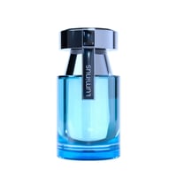 Rue Broca Luminus Pour Homme by Rue Broca 100ml Men — A clear blue glass perfume bottle with a silver cap and a silver label with the word 'Luminus' in black text.