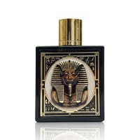 Rayhaan Pharaoh by Rayhaan 100ml EDP Unisex — Black perfume bottle with gold cap, featuring a raised, detailed gold pharaoh mask and hieroglyphics on the front.