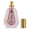 Ard Al Zaafaran Pink Blush Shams Al Emarat Khususi 50ml — Pink perfume bottle with gold spray nozzle and cap, label with Arabic script and English text, isolated on white background.