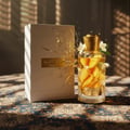 Armaf Club De Nuit Lionheart — Black gift box with gold text and lion emblem perfume bottle with gold cap and lion charm
