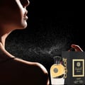 Afnan Supremacy Not Only Intense Extrait 100ml — Gray patterned box next to a tall, faceted, dark gradient glass perfume
