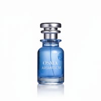 Osma Aromatic M Essence of Nature 75ml — Blue glass perfume bottle with silver cap, featuring subtle rose imprints and white text 'OSMA AROMATIC M'.