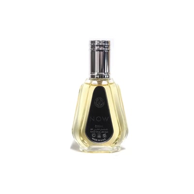 Ard Al Zaafaran Rave Now 50ml EDP for Men — Clear glass perfume bottle with a silver ribbed cap, containing yellow liquid, against a white background.