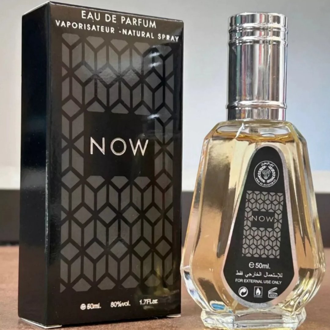Ard Al Zaafaran Rave Now 50ml EDP for Men — Black box with geometric pattern and silver 'NOW' logo next to a clear glass perfume bottle with silver cap and black label.