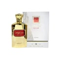 Asdaaf Sa'ud by Asdaaf 100ml EDP Unisex — Gold perfume bottle with red label and Arabic script, next to its white and gold patterned box.
