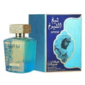 Lattafa Sheikh Al Shuyukh Supreme by Lattafa 100ml — A blue and green faceted glass perfume bottle with a gold textured cap sits next to its blue and light blue box, which features an image of a man in traditional headwear. | Lattafa Sheikh Al Shuyukh Supreme by Lattafa 100ml — Botol kaca berfaset biru dan hijau