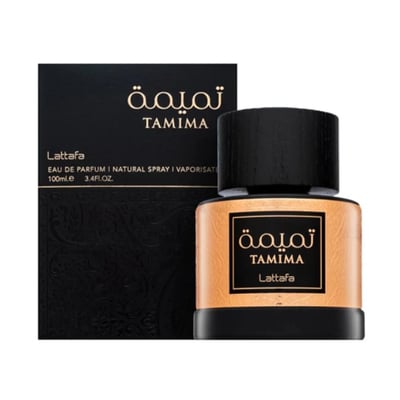 Lattafa Tamima — Black textured box with gold Arabic and English text next to a gold and black perfume bottle with a black cap. | Lattafa Tamima — Kotak bertekstur hitam dengan teks Arab dan Inggeris emas di sebelah botol minyak wangi emas dan hitam dengan penutup hitam.