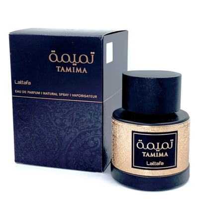 Lattafa Tamima by Lattafa 100 ml Eau de Parfum — A dark blue box with gold Arabic script and text 'TAMIMA' and 'Lattafa' sits next to a matching dark bottle with a gold patterned label and a dark wooden cap. | Lattafa Tamima by Lattafa 100 ml Eau de Parfum — Kotak biru gelap dengan tulisan Arab emas dan teks 'TAMIMA'