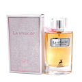 Maison Alhambra La Vivacite by Maison Alhambra 100ml EDP — A clear glass perfume bottle with orange liquid, a silver label, and a clear cap, placed next to its pink glitter textured box with the brand name embossed.