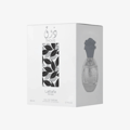 Lattafa Pride Thouq — White perfume box with Arabic calligraphy, leaf pattern, and a silver bottle with a rose-shaped cap.