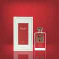 Lattafa Pride Sapphire Royal by Lattafa Pride — White box with gold trim and Arabic text next to a red glass perfume bottle with gold accents and a ribbed cap, set against a red gradient background.