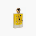 Lattafa Pride Tharwah Gold by Lattafa Pride 100ml EDP — Frosted glass bottle with yellow liquid, featuring a gold atom-like emblem with black beads, and a gold cap.