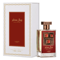Lattafa Pride Sapphire Royal — White box with gold trim and red panel, next to a clear glass perfume bottle with a red and bronze decorative front and a bronze cap.