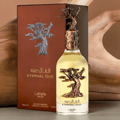 Lattafa Pride Eternal Oud — Brown box with embossed tree design next to a clear perfume bottle with a tree-shaped cap and embossed tree design.