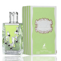 Maison Alhambra Sugar Me Pistachio Chocolate — A clear glass perfume bottle with green liquid and silver metallic accents, next to its green and white striped box with ornate silver frame.