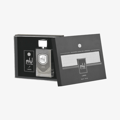Lattafa Liam Grey by Lattafa 100ml EDP — Grey perfume bottle with white cap, presented in an open black gift box with silver accents and Lattafa Liam Grey branding.