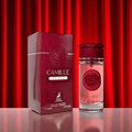 Maison Alhambra Camille by Maison Alhambra 100ml EDP — A burgundy box and a clear glass perfume bottle with a rose design on the bottle and cap, set against a red curtain background.