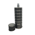 Lattafa Pride Pisa by Lattafa Pride 100ml EDP — A silver perfume bottle shaped like the Leaning Tower of Pisa, with its cap placed beside it on a white background.