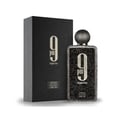 Afnan 9 PM Night Out Extrait de Parfum — A black textured box and a matching textured perfume bottle with a round cap are displayed against a white background. | Afnan 9 PM Night Out Extrait de Parfum — Sekotak kotak bertekstur hitam dan sebotol minyak wangi bertekstur yang sepadan dengan penutup bulat dipaparkan
