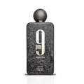 Afnan 9 PM Night Out Extrait de Parfum — A dark, textured rectangular perfume bottle with a spherical cap, featuring a large white '9' and 'pm' on the front, with 'Night Out' below. | Afnan 9 PM Night Out Extrait de Parfum — Botol minyak wangi segi empat gelap bertekstur dengan penutup sfera, menampilkan '9' dan 'pm'
