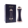 Lattafa Pride Al Khas Winners Trophy Gold 100ml — A navy blue box with gold Arabic and English text sits next to a dark blue and gold trophy-shaped perfume bottle with a gold globe cap. | Lattafa Pride Al Khas Winners Trophy Gold 100ml — Sebuah kotak biru navy dengan teks Arab dan Inggeris emas terletak di sebelah