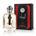Ard Al Zaafaran Al Sayaad For Men EDP — Clear glass perfume bottle with silver fluted cap and red accent, next to its black and red textured box with Arabic calligraphy and silver emblem.