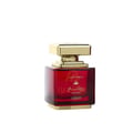 Al Wataniah Rawaee Monarch Eau De Parfum — A red glass perfume bottle with a gold cap and base, featuring Arabic and English text on the label. | Al Wataniah Rawaee Monarch Eau De Parfum — Botol kaca merah dengan penutup dan tapak emas, menampilkan teks Arab dan Inggeris pada label.