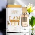 Lattafa Ana Abiyedh Poudree by Lattafa 60ml — A white and gold perfume box stands next to a clear glass perfume bottle with a gold cap, with a white flower and green leaves in the background. | Lattafa Ana Abiyedh Poudree by Lattafa 60ml — Kotak minyak wangi putih dan emas berdiri di sebelah botol minyak wangi kaca