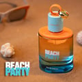 Armaf Beach Party Eau De Parfum — A perfume bottle with an orange and blue gradient glass bottle sits on sand, with sunglasses and a seashell in the background. | Armaf Beach Party Eau De Parfum — Sebotol minyak wangi dengan botol kaca gradien oren dan biru duduk di atas pasir, dengan cermin mata hitam dan cangkerang