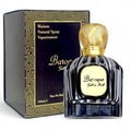 Maison Alhambra Baroque Satin Oud 100ml — A black fluted perfume bottle with a gold textured cap sits next to its matching dark blue and gold patterned box. | Maison Alhambra Baroque Satin Oud 100ml — Botol minyak wangi hitam berlekuk dengan penutup bertekstur emas duduk bersebelahan dengan kotak corak biru gelap dan