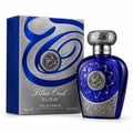 Lattafa Blue Oud Elixir — Blue glass perfume bottle with ornate silver cap and intricate silver detailing on the bottle and box. Includes box.