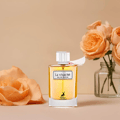 Maison Alhambra La Vivacite by Maison Alhambra 100ml EDP — Clear glass perfume bottle with golden liquid, white label, and silver cap, placed on a surface with peach roses and a vase of roses in the background.